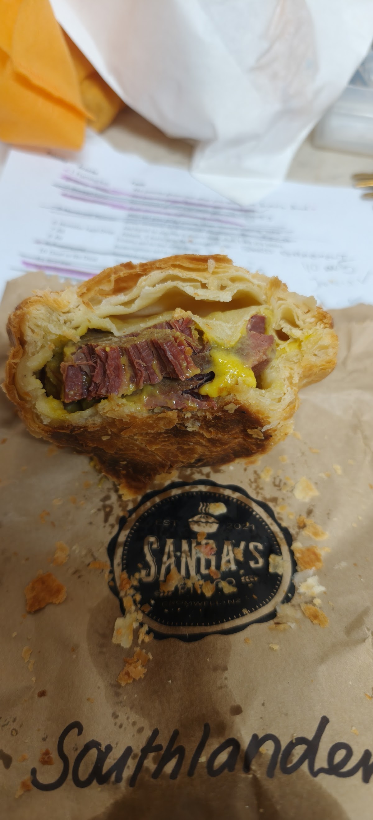 A corned beef pie cut open to show the filling