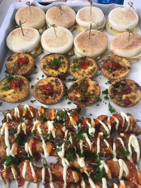 A Make n Bake catering platter of muffin sliders, mini quiches and glazed skewers